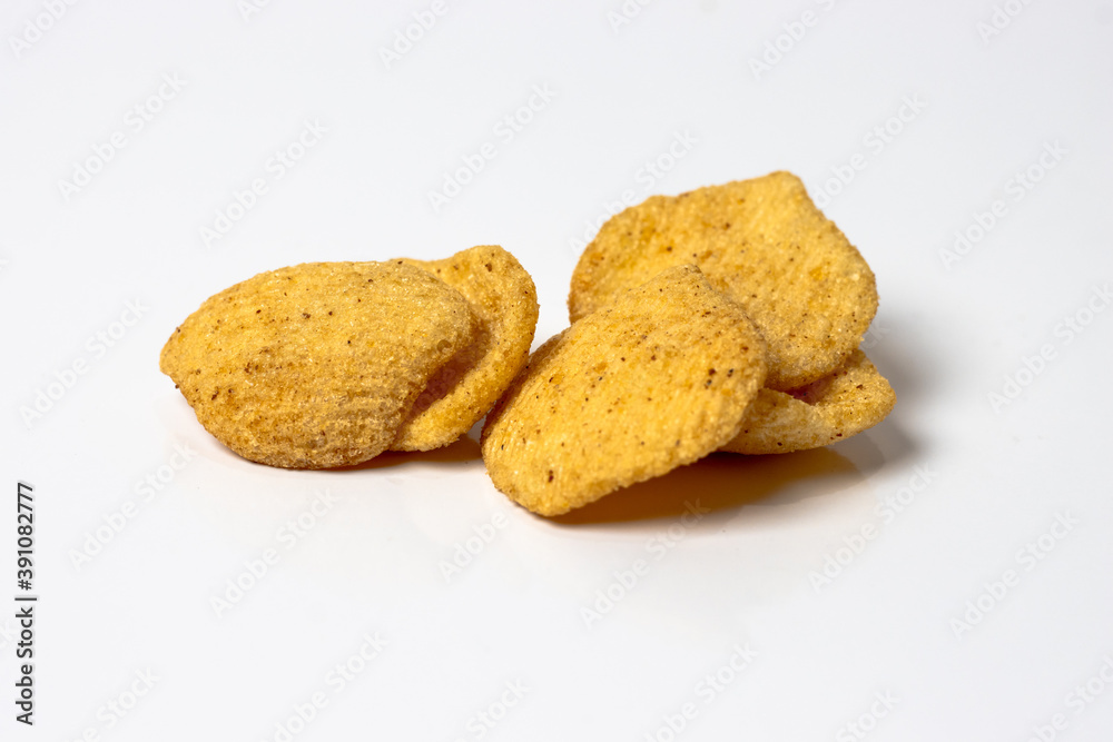 Sweet crispy delicious potato fry chips close up look isolated on white background