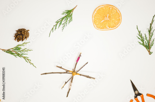 Step by step making of wooden branch star. Christmas tree zero waste decoration. Holiday craft guide 