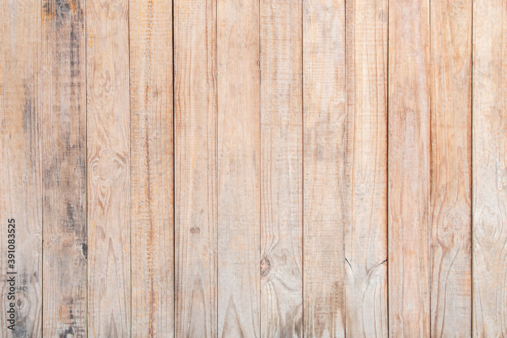 Top view of an old wooden table made of lath obtained from pallets. Old wooden planks for the background.