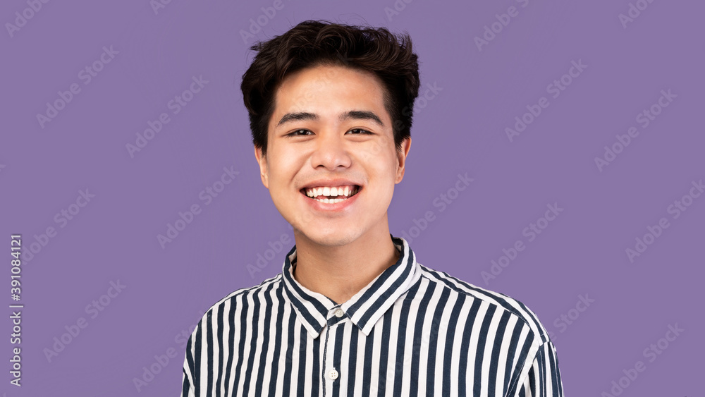 Portrait of attractive asian guy posing at studio Portrait of attractive asian guy posing at studio