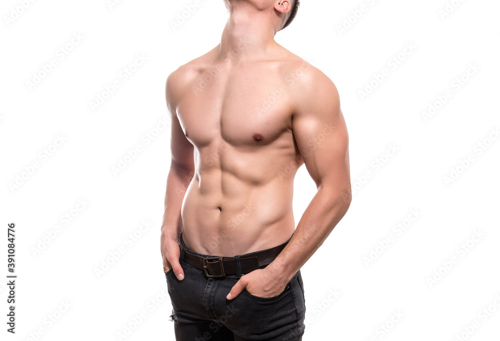 Muscular male torso of fit bodybuilder isolated on white Muscular male torso of fit bodybuilder isolated on white