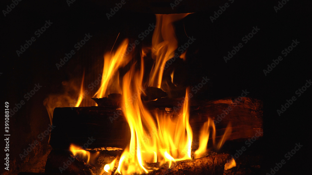 Close-up view of flames in the fireplace. Close-up view of flames in the fireplace.