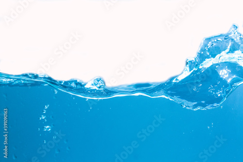 Blue water wave and bubbles isolated on white background. blue water surface with splash  waves and air bubbles to clean drinking water. Can be used for graphic designing  editing  putting on products