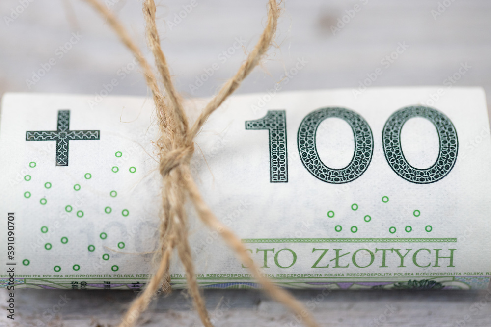 Polski banknot 100 złotych ze wstążką  - obrazy, fototapety, plakaty 