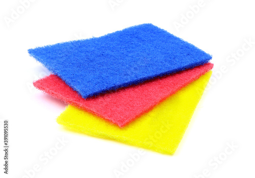 Kitchen washcloth for cleaning isolated on a white background. Colorful sponge