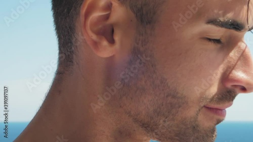 portrait of a handsome man in the pool, Close up