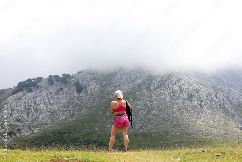 woman walking in the mountains