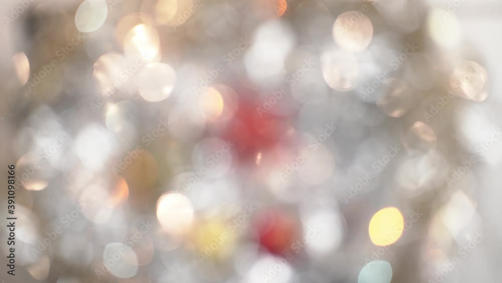 Rotate defocused of blurred colorful bokeh circle light flashing wiggle from lighting bulb, Abstract colorful glare, rotating bokeh background, holiday and Christmas concept Rotate defocused of blurred colorful bokeh circle light flashing wiggle from lighting bulb, Abstract colorful glare, rotating bokeh background, holiday and Christmas concept
