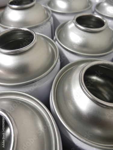 close up of empty aerosol cans