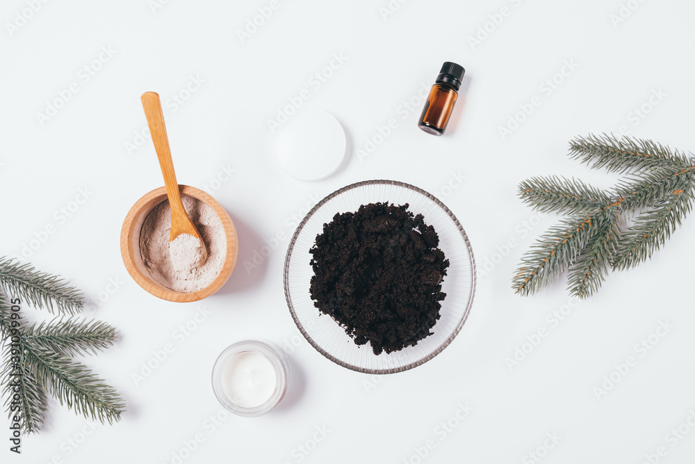 Coffee body scrub ingredients on white table Coffee body scrub ingredients on white table