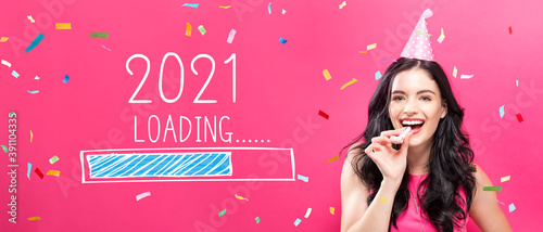 Loading new year 2021 with young woman with party theme on a pink background