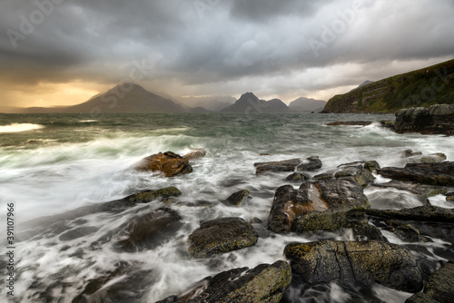 Rough waves crashing on rocky shoreline at Elgol on the Isle of Skye, Scotland, UK. 