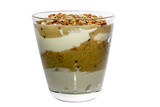 Yogurt with bananas and muesli in a glass Cup on a white background