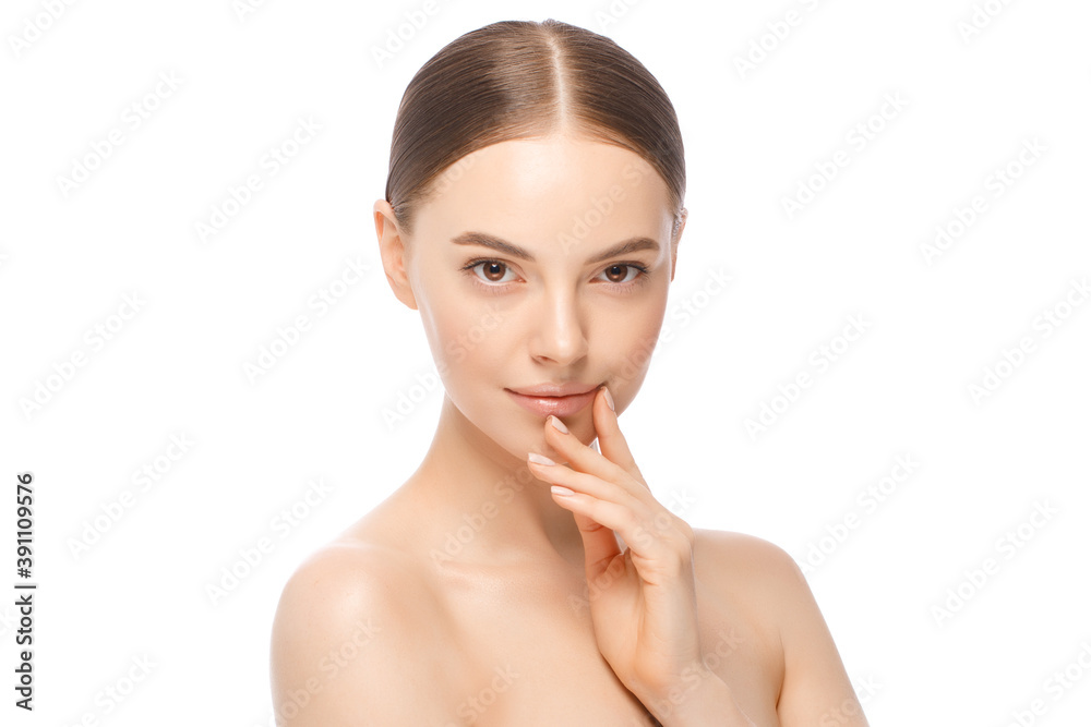 Beauty portrait of young female model with hand near face, isolated on white background. Skin care treatment or cosmetic ads Beauty portrait of young female model with hand near face, isolated on white background. Skin care treatment or cosmetic ads