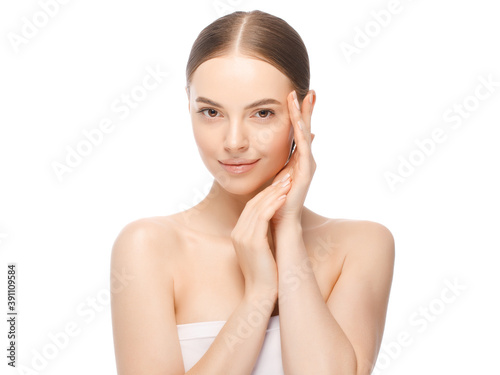 Beauty portrait of woman or female model holding hands near face with perfect clean skin, isolated on white background. Skin care or cosmetic ads.