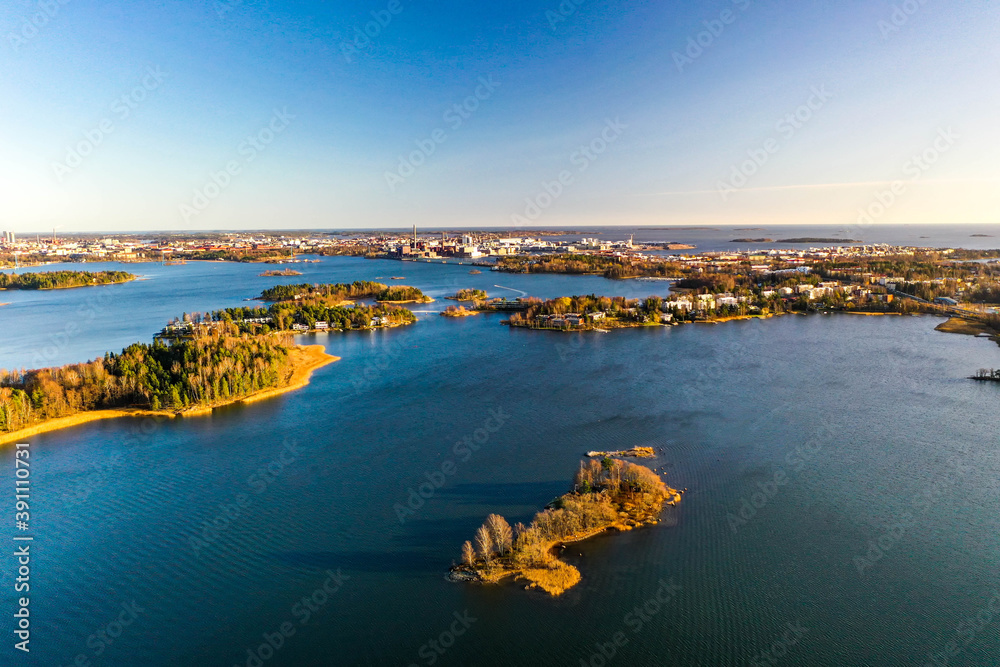 Aerial view of ocean, islands and city in Helsinki, Finland. Lehtisaari, Kaskisaari and Lauttasaari.