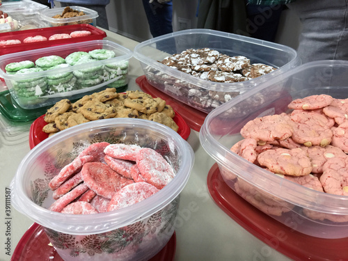 Homemade Christmas cookies at a bake sale.