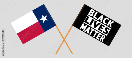 Crossed flags of the State of Texas and blm
