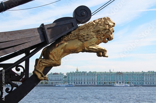 Golden lion guarding the city. St. Petersburg.