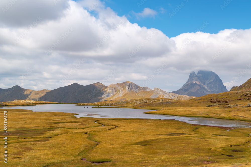 Lake Anayet with the Midi d'ossau peak in the background in the Pyrenees.