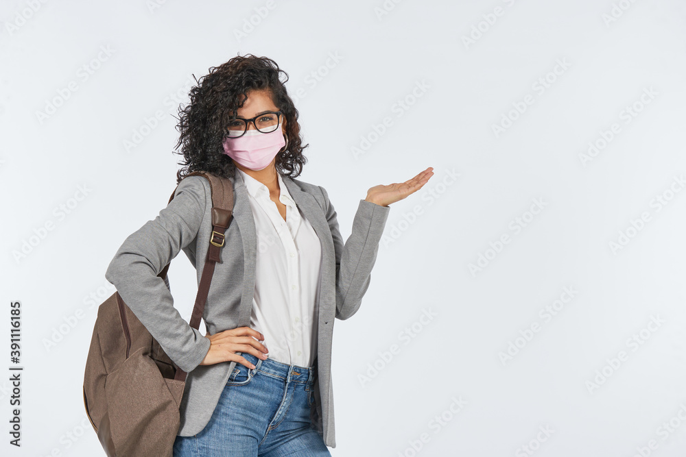 University student ready to study with a mask due to the covid-19 pandemic University student ready to study with a mask due to the covid-19 pandemic