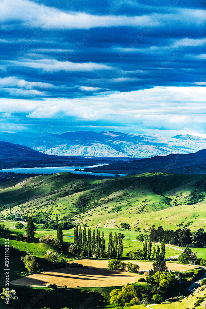 Green valley with a mountain lake Green valley with a mountain lake