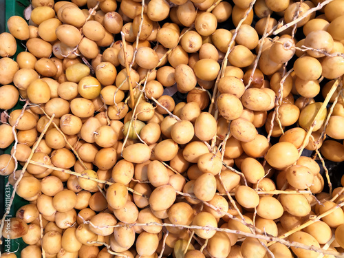 Sweet Fresh Arabic Yellow Dates Fruit photo