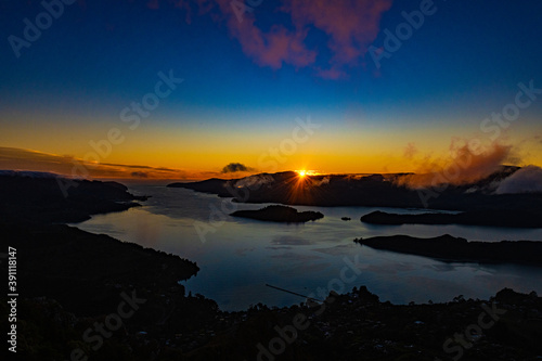 Sunrise at a fjord in New Zealand