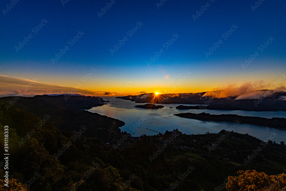 Fototapeta premium Sunrise at a fjord in New Zealand