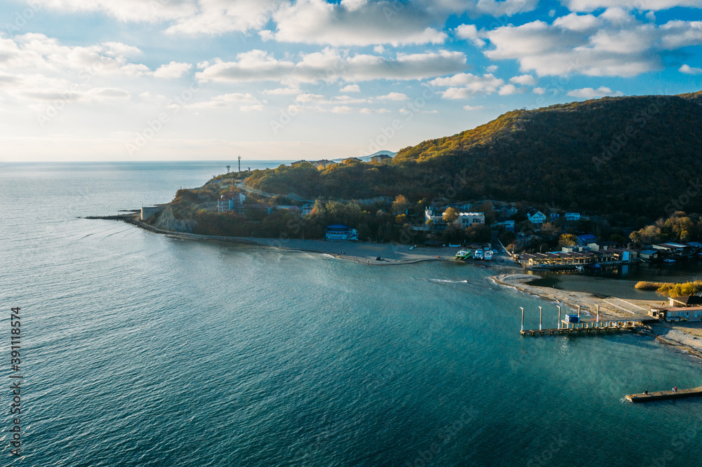 Beautiful aerial panorama of Arkhipo-Osipovka beach and promenade in Gelendzhik region, black sea coast, resort for vacations and pleasure, view from above.