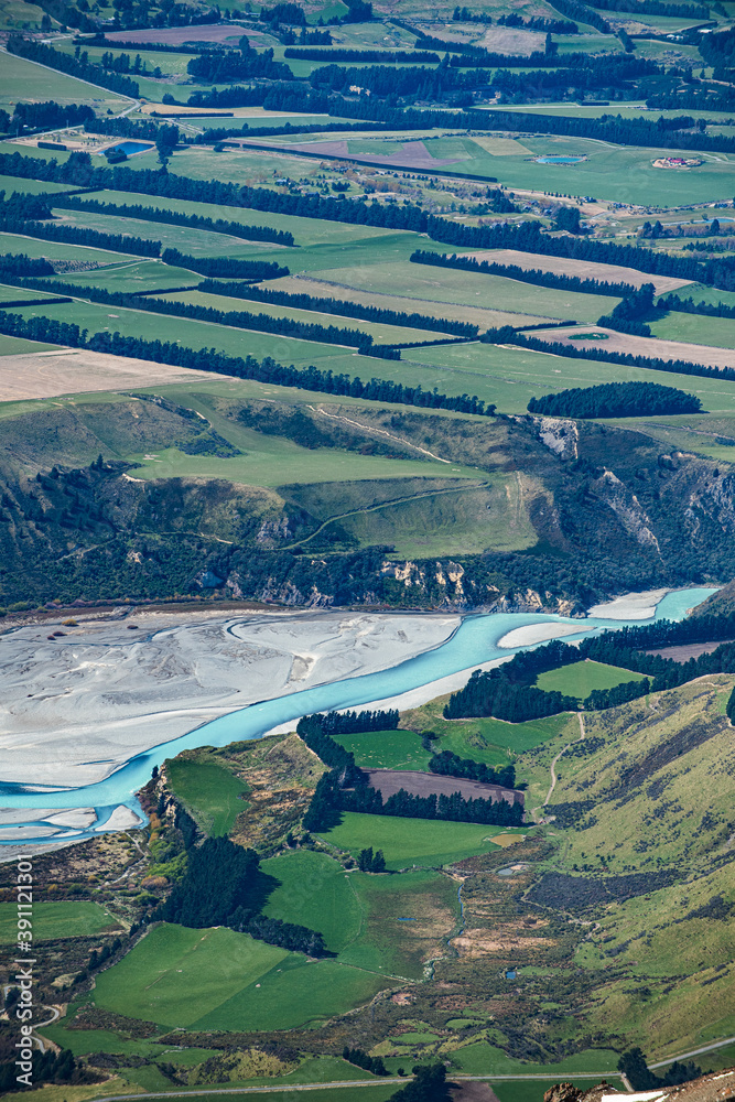 Snow covered mountains and green valleys in New Zealand