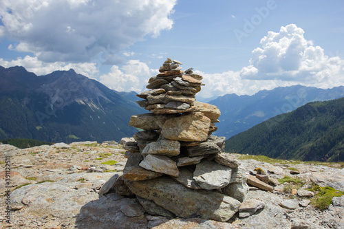 Cairn on the top of a mountain in switzerland © Luciernaga