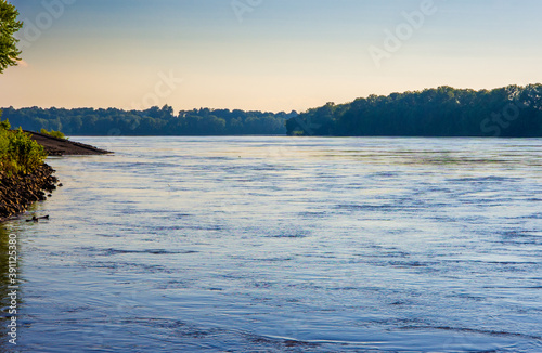 Fotografie View of the waters of the Mississippi an Missouri rivers merging together and fl