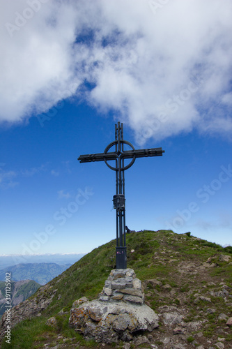 summit cross on the rossstock, a mountain in central switzerland © Luciernaga