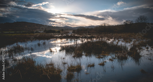 Flooded Lough Allua lake at sunset. southwest ireland. A lake lying on the river Lee which flows into Cork.