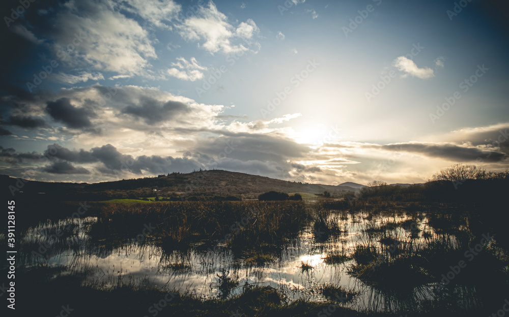 Flooded Lough Allua lake at sunset. southwest ireland. A lake lying on the river Lee which flows into Cork.	
