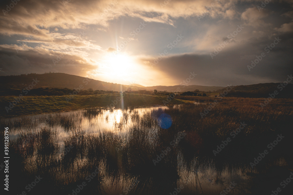 Flooded Lough Allua lake at sunset. southwest ireland. A lake lying on the river Lee which flows into Cork.	