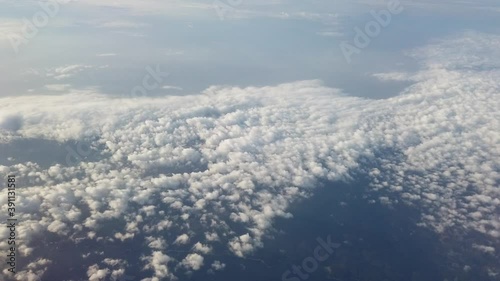 New normal Empty air traffic clear sky white cloud with sun from fly above high clouds view safe flight travel after coronavirus pandemic