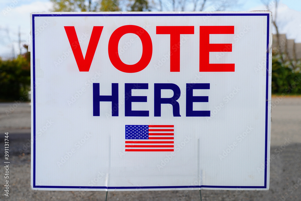 A sign saying Vote Here on Election Day in New Jersey A sign saying Vote Here on Election Day in New Jersey