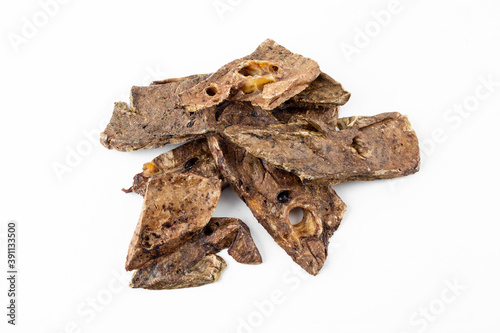 dried tendons of beef  lamb  pork  deer dog treats on white background