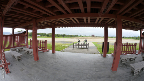 inside the Nara palace area showing wooden structure  shrine and cycling trail 
