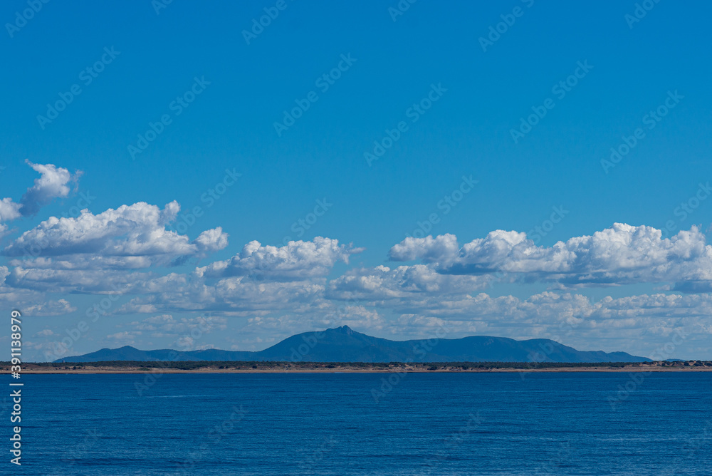 Mount Larcom on the horizon