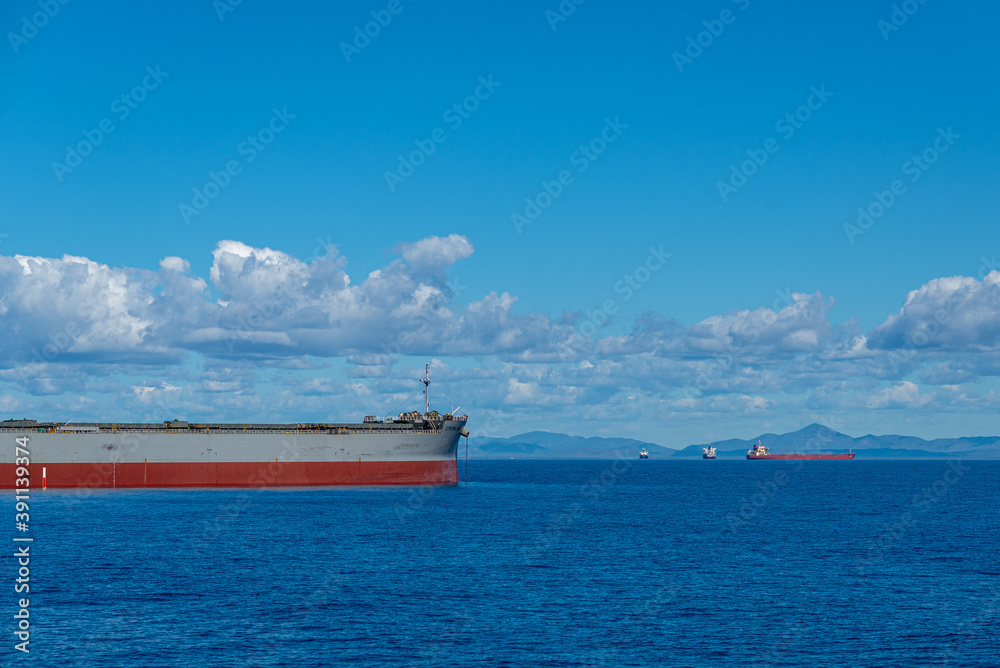 Anchorage of ships with one in foreground Coral Sea