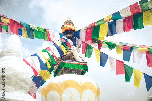 tibetan buddhist prayer flags on a stupa in Namo Buddha monastery in Nepal, spirituality and meditation concept, kora walks and clean karma photo