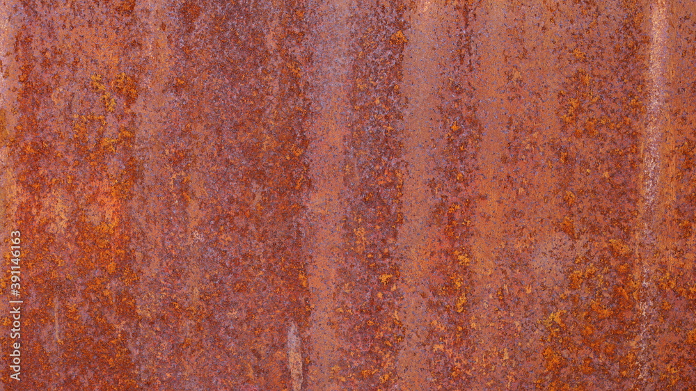 Old rusted steel plate background. Grunge background of weathered red brown metal surface Due to its chemical reaction with water and air. Selective focus Old rusted steel plate background. Grunge background of weathered red brown metal surface Due to its chemical reaction with water and air. Selective focus