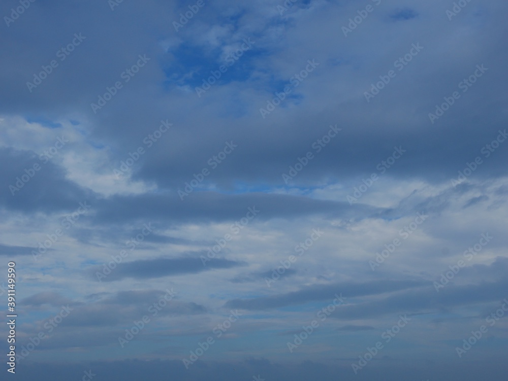 Blue sky with fluffy cloud in rainy season. Beautiful sky in vacation concept. 