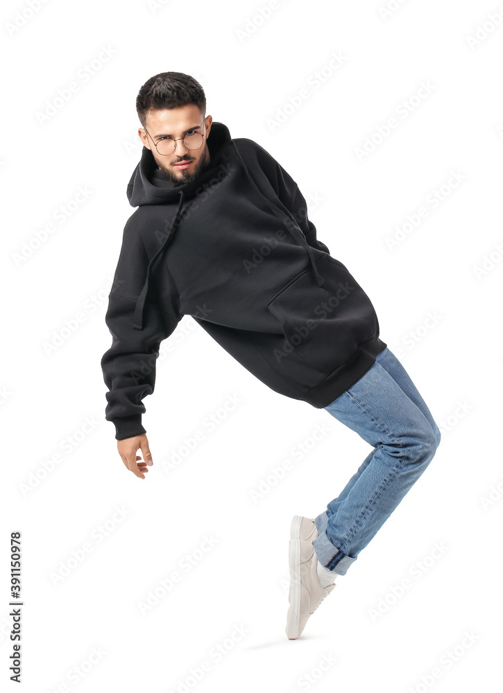 Naklejka premium Fashionable young man on white background