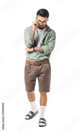 Fashionable young man on white background © Pixel-Shot