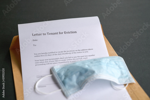 Canvas Print Eviction notice with face mask on top of envelope