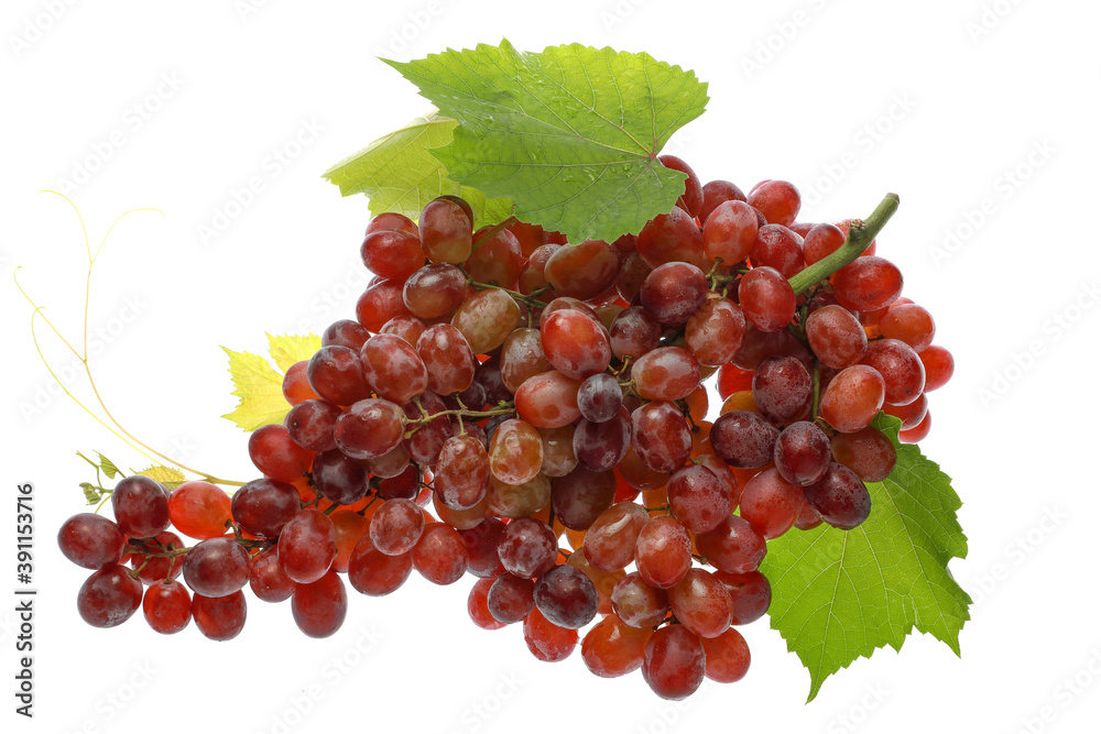 Fototapeta premium Close up Red Seedless Grapes with grape leaf and water drops, isolated on white background.